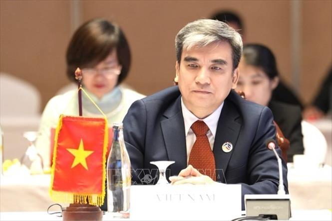Ông Lưu Quang Tuấn, Vụ trưởng Vụ Hợp tác quốc tế, Bộ Lao động, Thương binh và Xã hội, phát biểu tại Hội nghị. Ảnh: Đỗ Bá Thành - PV TTXVN tại Lào
